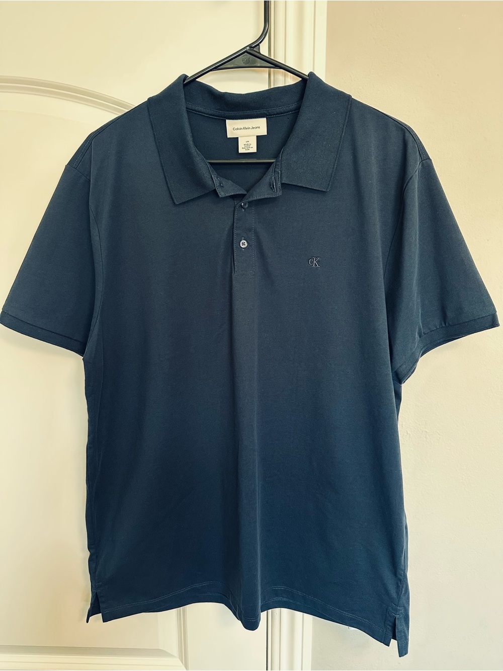Calvin Klein Men's Dark Navy Polo Shirt with Subtle CK Logo